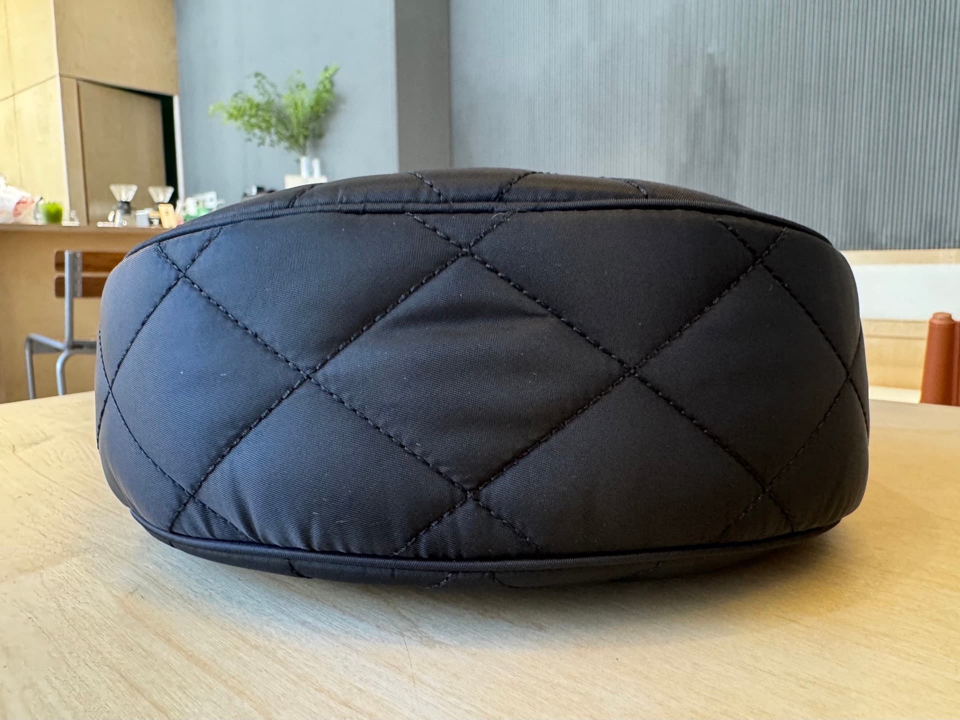 C44 [B’s top-tier original products] Slanted backpack, inspired by the elegance of English countryside. Made from quilted nylon blend fabric, adorned with fine-broken Bur pattern in the new season’s colors. Features leather trim and a knight’s seal in the — image 5