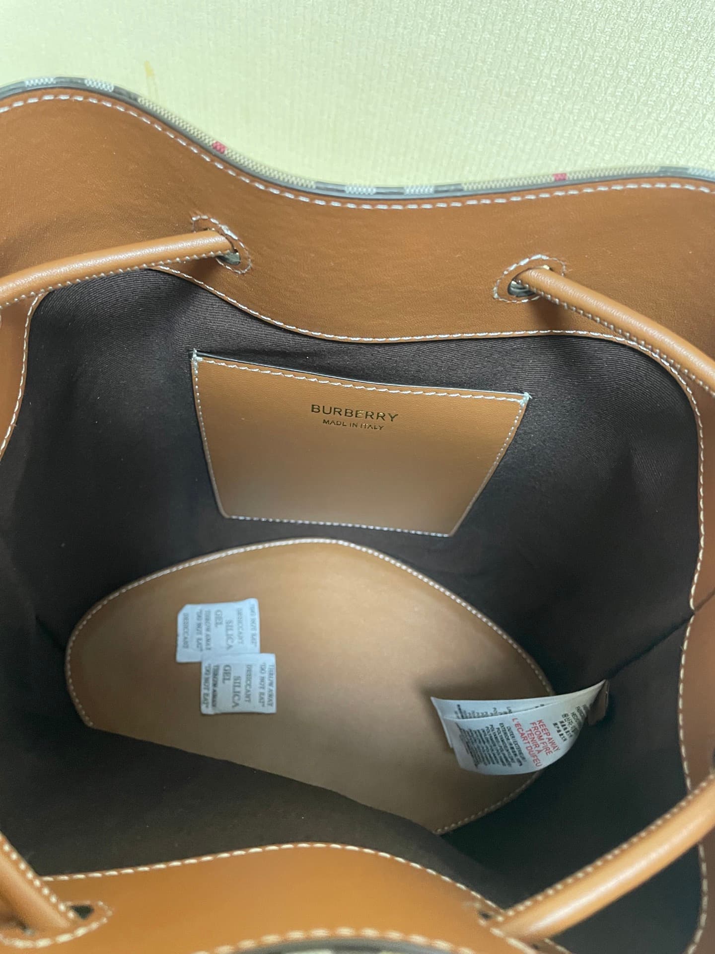 C12 B brand's latest bucket bag, crafted from large vintage/retro checked and glossy thread leather, adorned with the TB exclusive logo. This bag is a new member of the TB bag collection, featuring a detachable adjustable crossbody strap and an inner pock — image 7