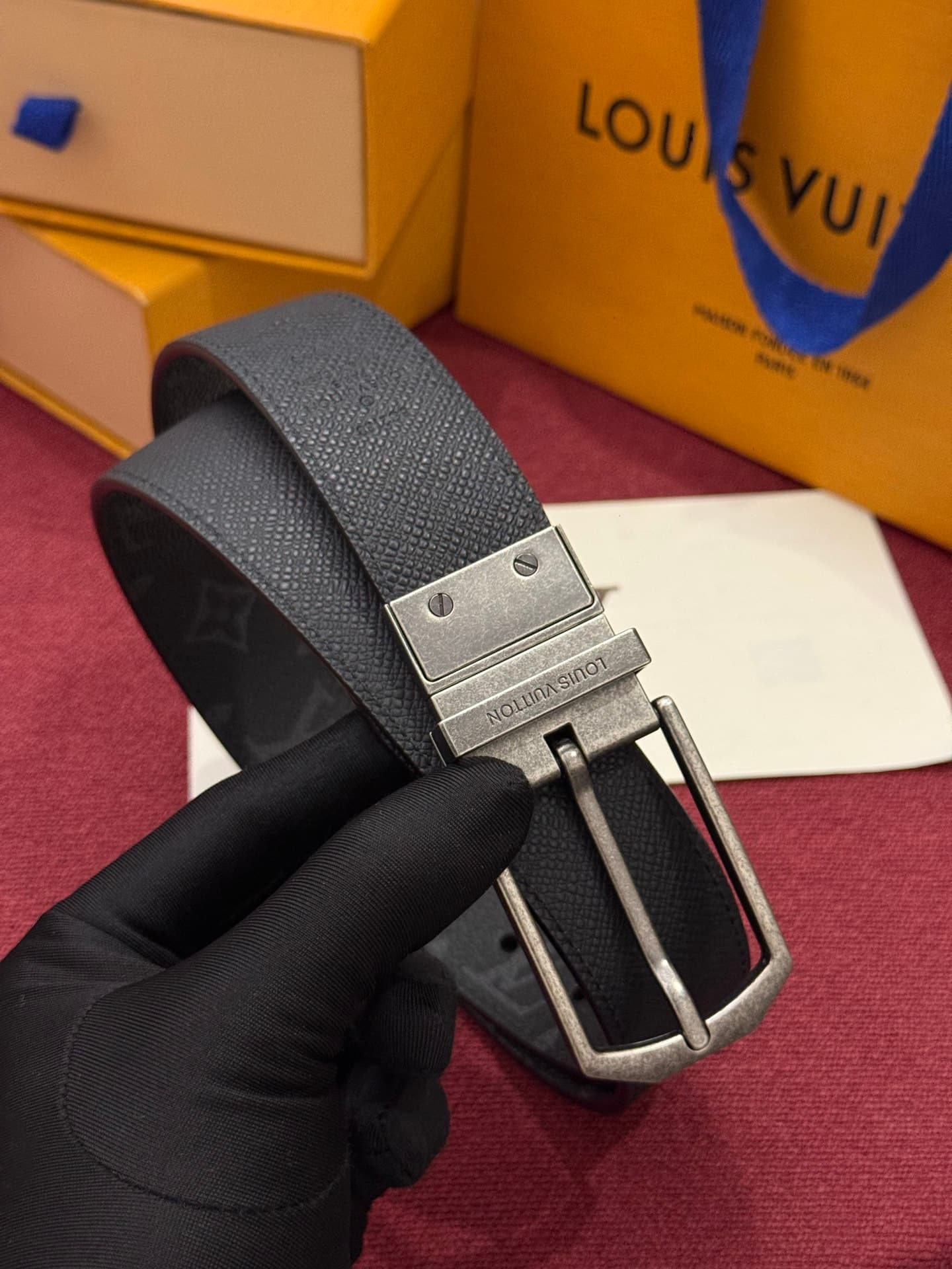C32955 This Slender double-sided belt features Monogram-coated canvas and leather materials, along with intricate buckles and metal bands adorned with Louis Vuitton logos. — image 6