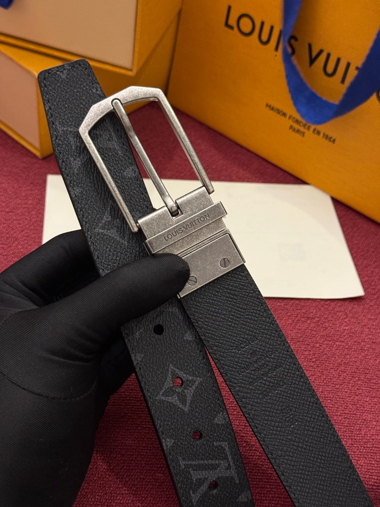 C32955 This Slender double-sided belt features Monogram-coated canvas and leather materials, along with intricate buckles and metal bands adorned with Louis Vuitton logos. — image 3