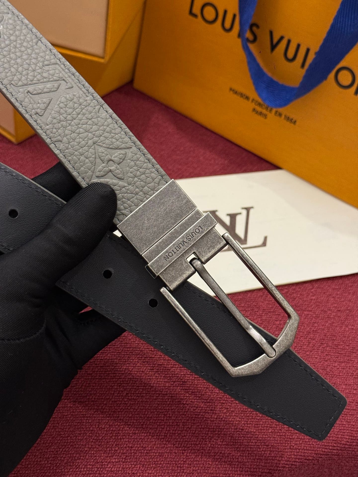 C32951 This Slender double-sided belt is made of Monogram leather, offering a stylish look. It features intricate buckles and metal bands with Louis Vuitton logos. — image 4