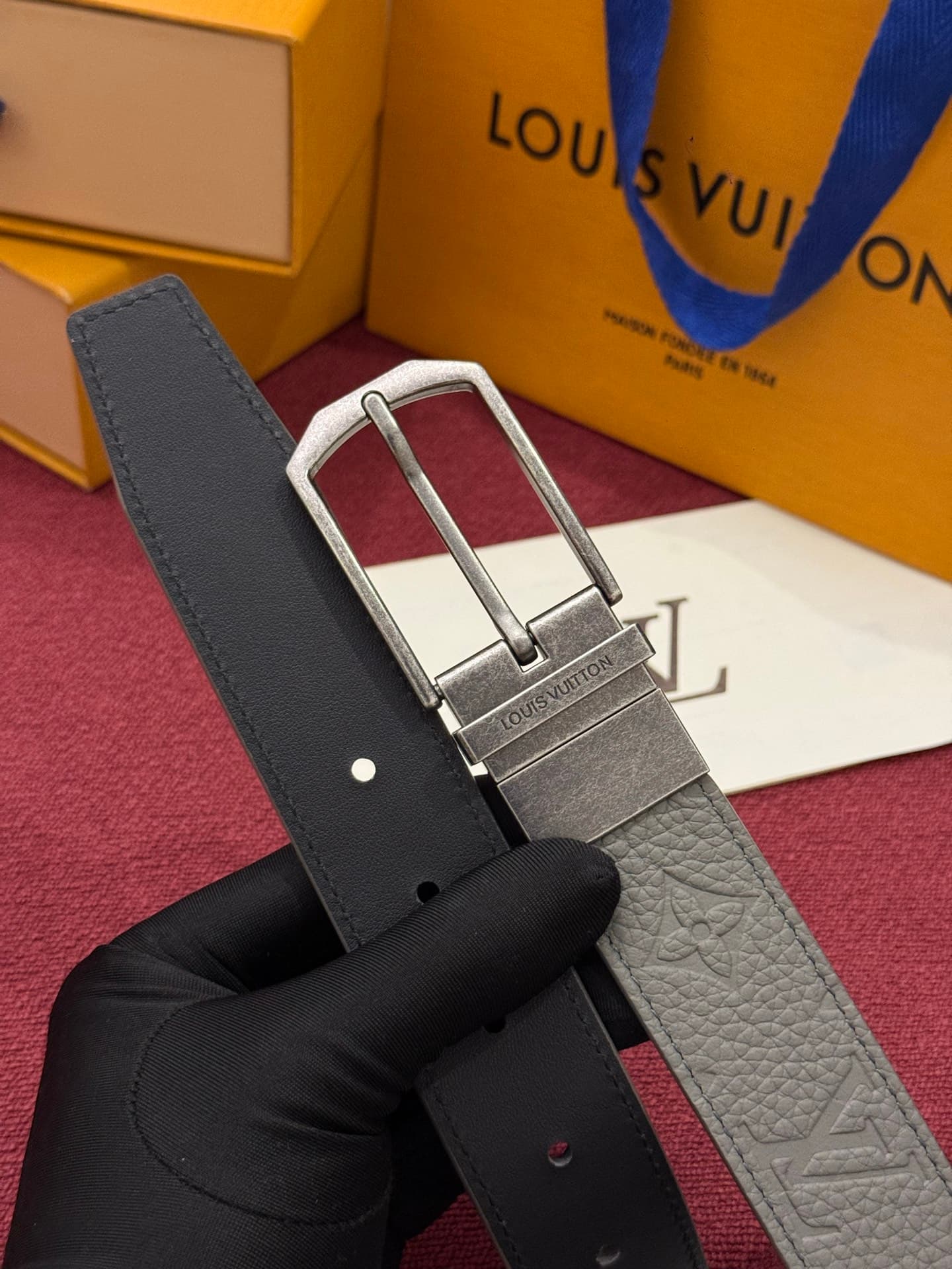 C32951 This Slender double-sided belt is made of Monogram leather, offering a stylish look. It features intricate buckles and metal bands with Louis Vuitton logos. — image 2