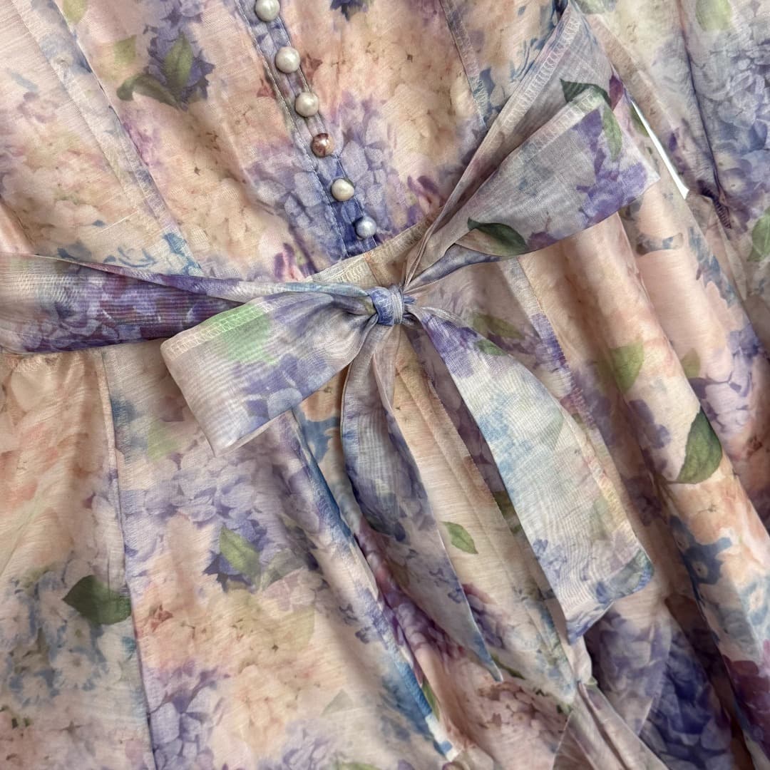 C18262 Item number: 20254120 Zimmermann new model. Hyacinth flower print,荷叶-shaped belt, bell-shaped long-sleeved dress with a short skirt. Purple and yellow colors. S-XL sizes. [Size M: bust size 90, sleeve length 66, waist size 72, overall length 95] — image 5