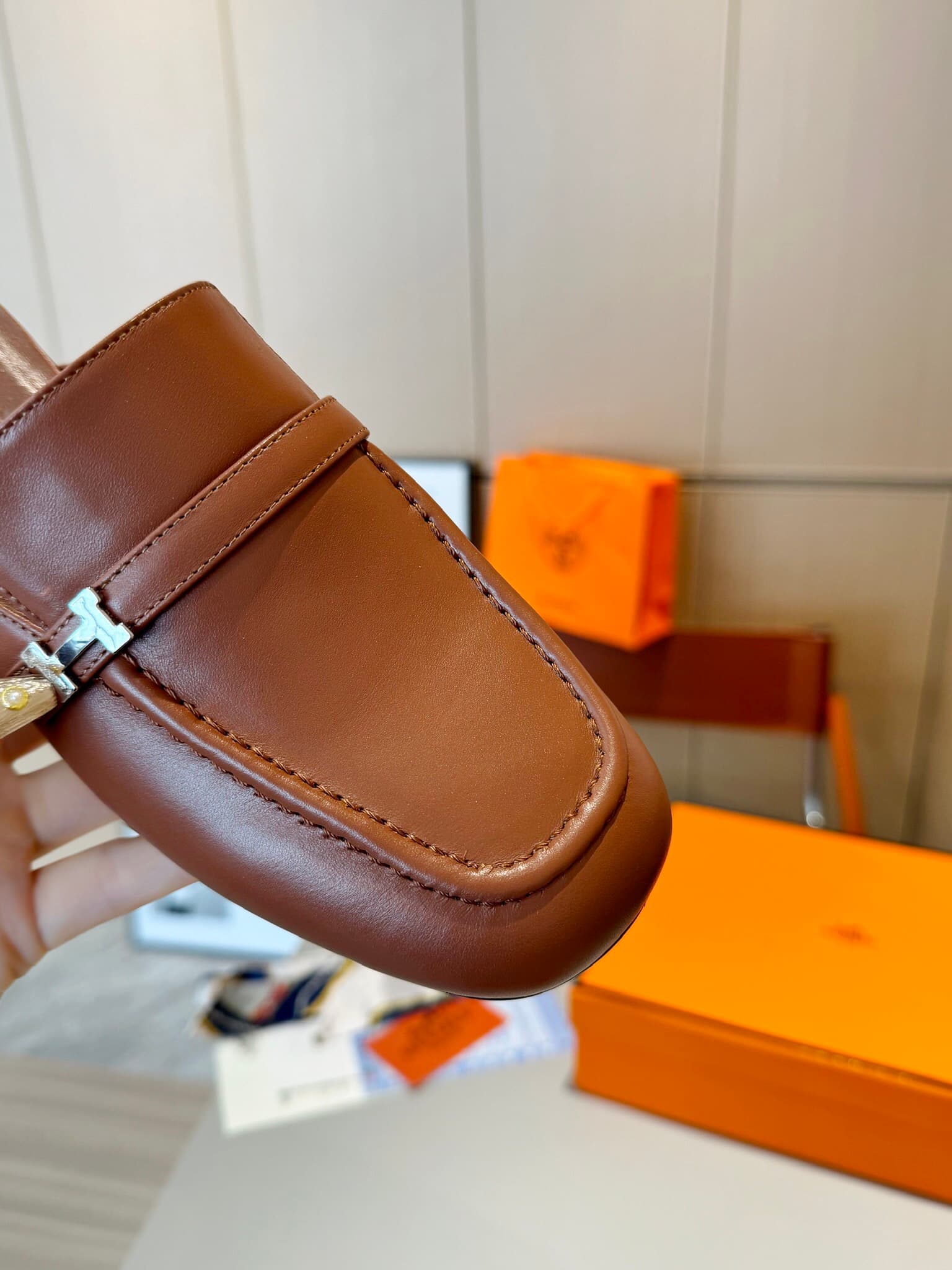 D8023 Hermès Groupie square-toe H-closure mules – semi-high heels and flat heels. The fit provided by the store is unparalleled. These mules feature H-closure closures made of canvas and calfskin, along with mini silver Paris clasps and contrasting trim.  — image 7