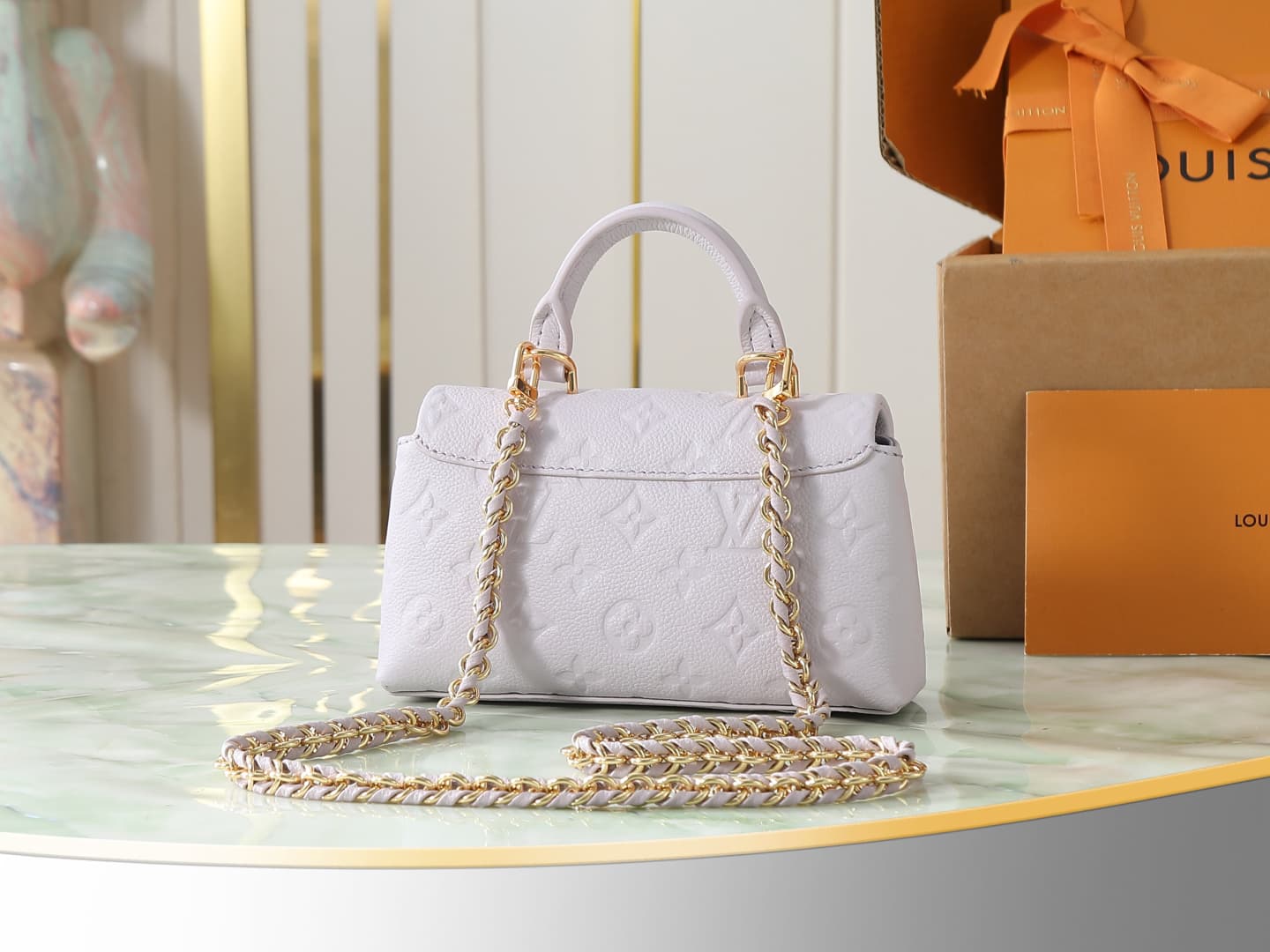 C5187 【Top-quality original items, exclusive real photos】M29380 light purple, full leather embossing, chain bag collection. New season model. NANO MADELEINE handbag. M12145 milky white. This Nano Madeleine handbag features Monogram Empreinte leather, repr — image 3