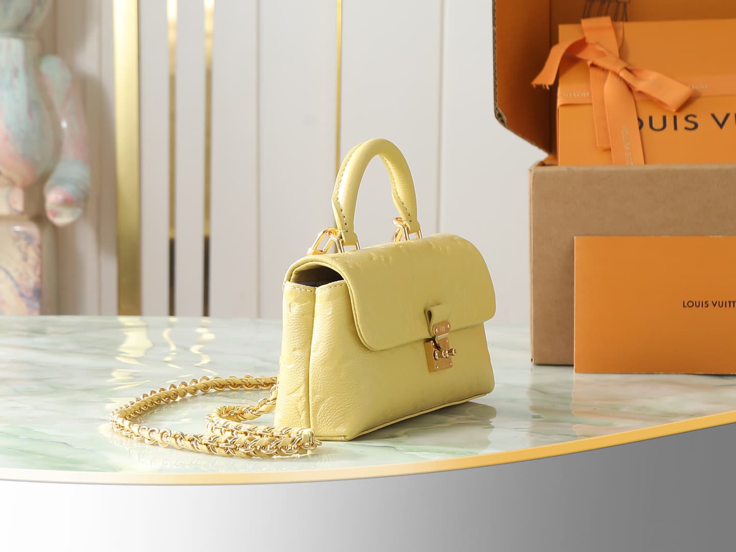 C5186 【Top-quality original items, exclusive real photos】M29378 yellow, full leather embossing, chain bag collection. New season model. NANO MADELEINE handbag. M12145 milky white. This Nano Madeleine handbag features Monogram Empreinte leather, creating a — image 2
