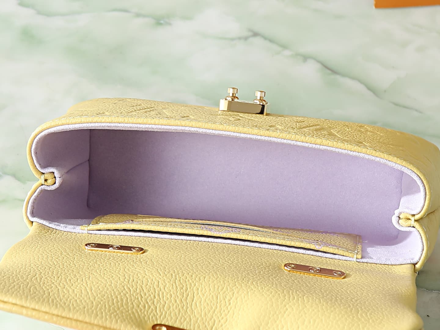C5186 【Top-quality original items, exclusive real photos】M29378 yellow, full leather embossing, chain bag collection. New season model. NANO MADELEINE handbag. M12145 milky white. This Nano Madeleine handbag features Monogram Empreinte leather, creating a — image 8