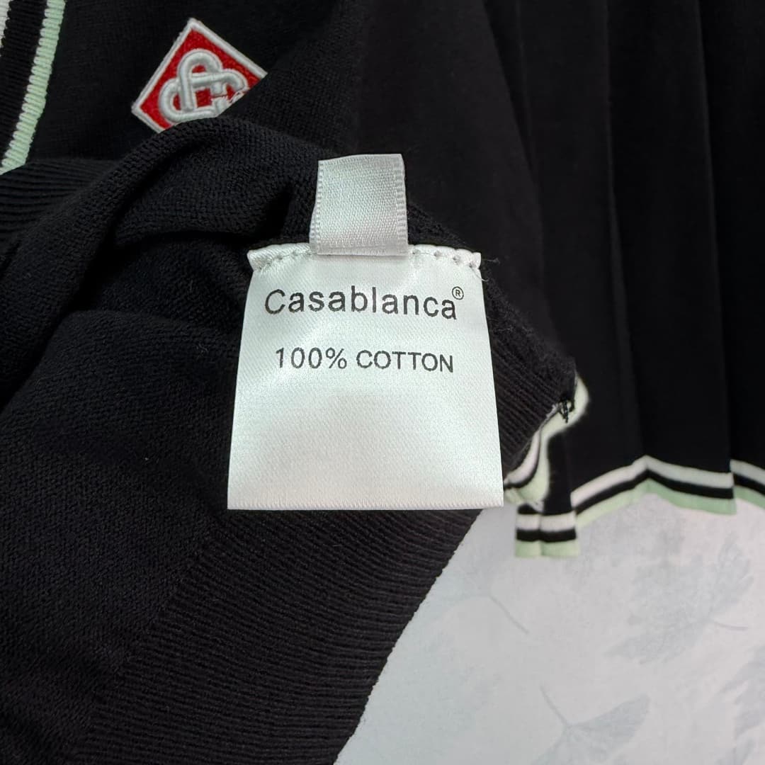 C18448 🆕CA*26 – New spring/summer school-style outfit: short knit top + pleated skirt. Black with white stripes. Simple yet energetic design. The top has a V-neck, with brand embroidery on the chest; short sleeves provide better ventilation. The skirt has — image 6