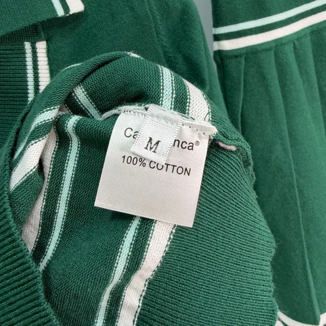 C18449 🆕CA*26 – New spring/summer school-style outfit: short-sleeved knitted top + pleated skirt. Deep green color with white stripes; simple yet energetic style. The top has a V-neck design, with brand embroidery on the chest; short sleeves ensure better — image 6