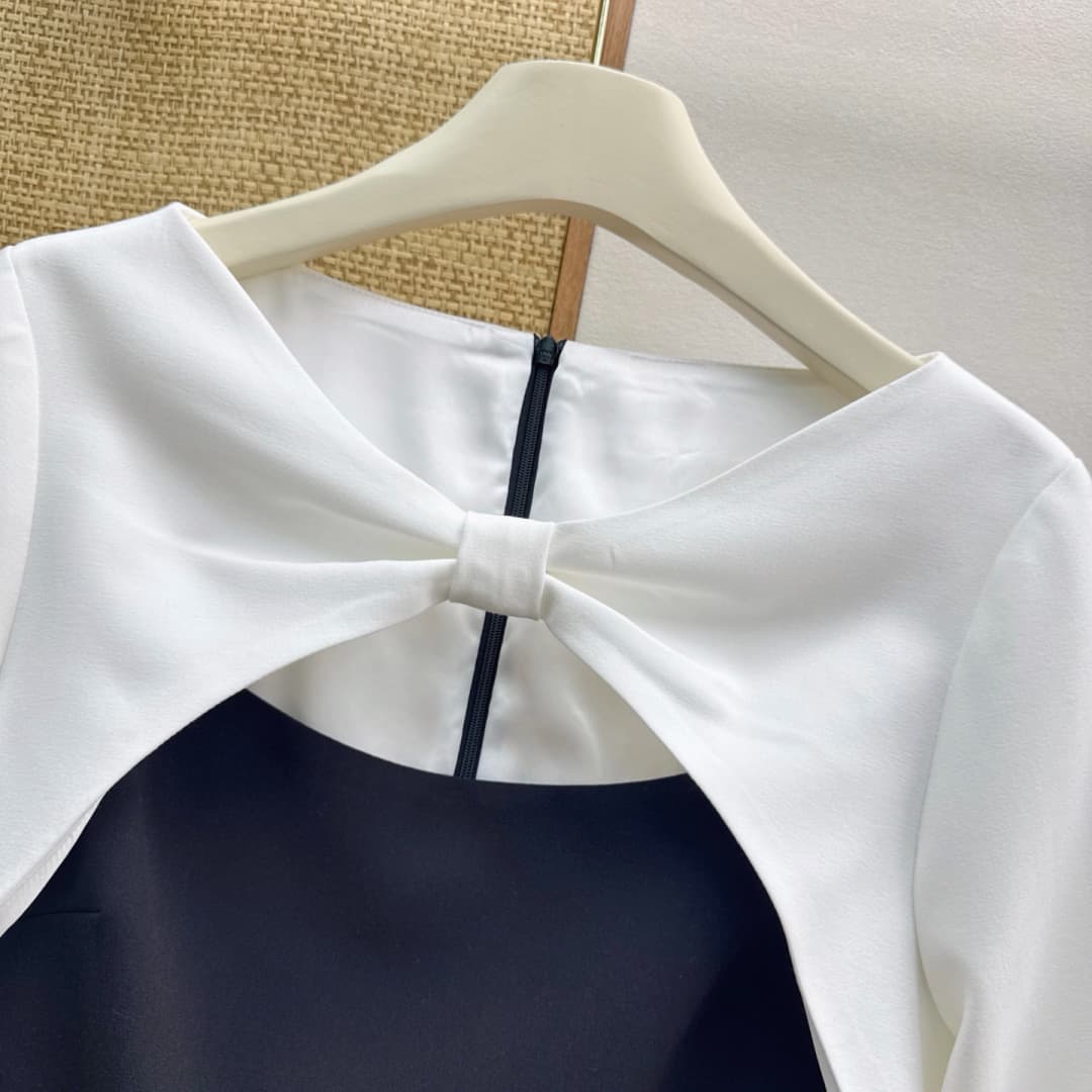 C18406 VLTN 26SS——A new spring dress with contrasting colorful fake-jacket-style design. The knot at the chest and the open areas serve as the focal points of the dress. It combines elegance with a bit of clever design, breaking away from the monotony of  — image 4