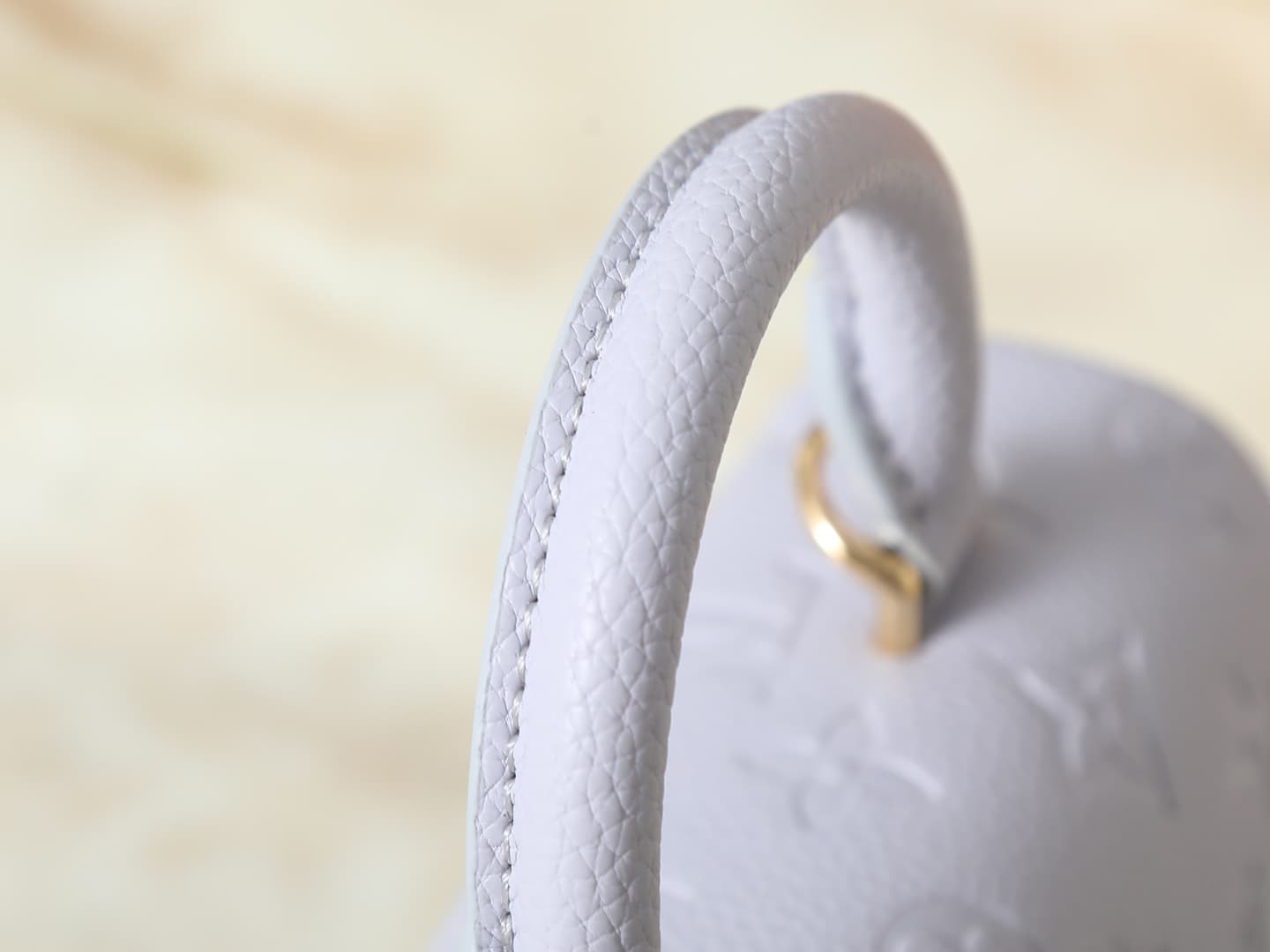 C5151 💰 Upgrade from the original M27034, M25596, M13796, M12145, M12144, and M12211. The Nano Madeleine handbag features a new season of dreamy colors, allowing easy styling in various ways. The classic Monogram Empreinte leather body is paired with the  — image 5