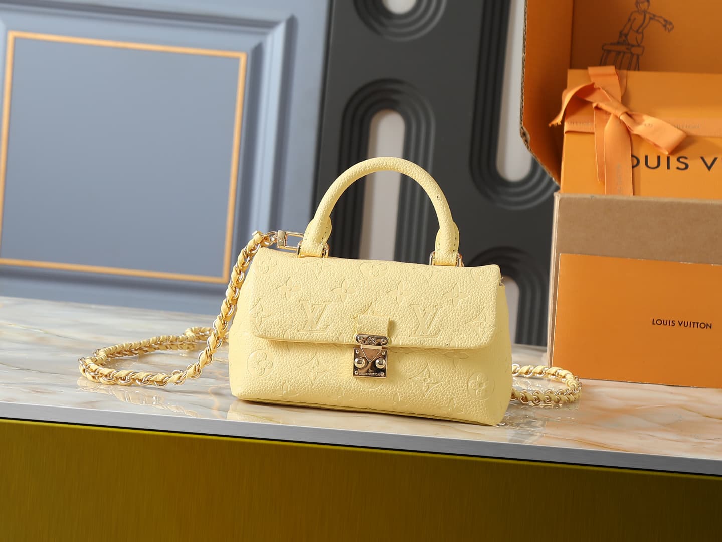 C5150 💰 Upgrade from the original M27034, M25596, M13796, M12145, M12144, M12211. This Nano Madeleine handbag features a new season’s enchanting colors, allowing you to easily complete various styles. The classic Monogram Empreinte leather body is paired  — image 1
