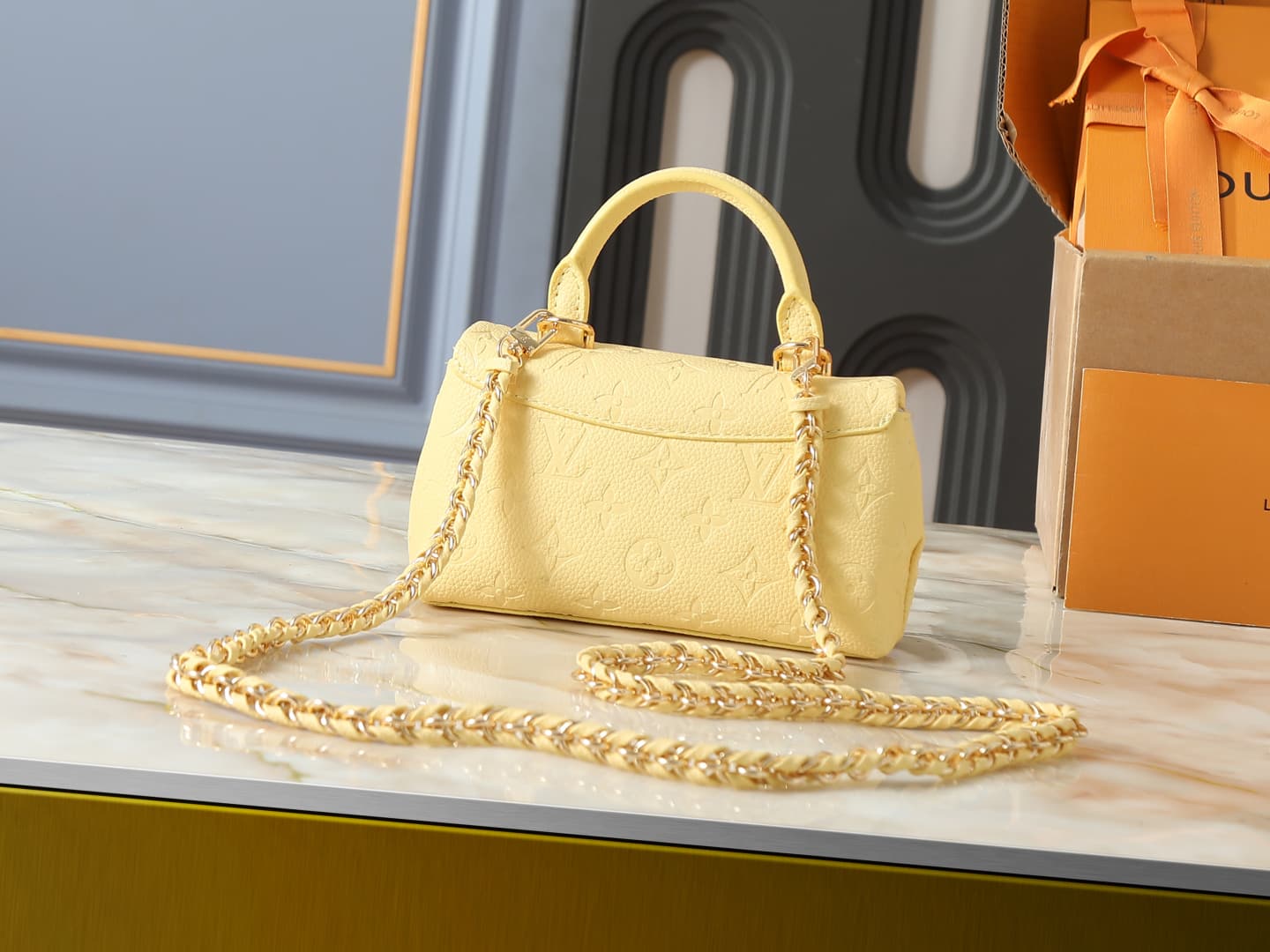 C5150 💰 Upgrade from the original M27034, M25596, M13796, M12145, M12144, M12211. This Nano Madeleine handbag features a new season’s enchanting colors, allowing you to easily complete various styles. The classic Monogram Empreinte leather body is paired  — image 3