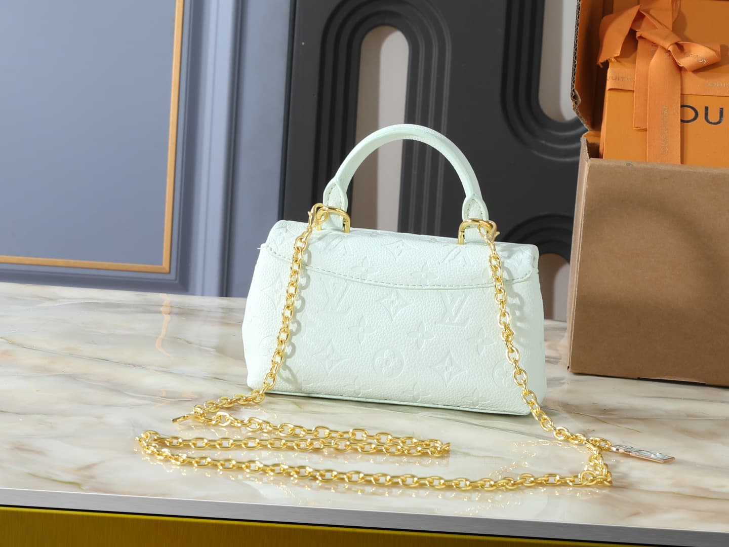 C5012 💰 Upgrade from the original M29785, M27034, M25596, M13796, M12145, M12144, and M12211. The Nano Madeleine handbag features a new seasonal design with colorful accents that can easily enhance various styles. The classic Monogram Empreinte leather bo — image 3