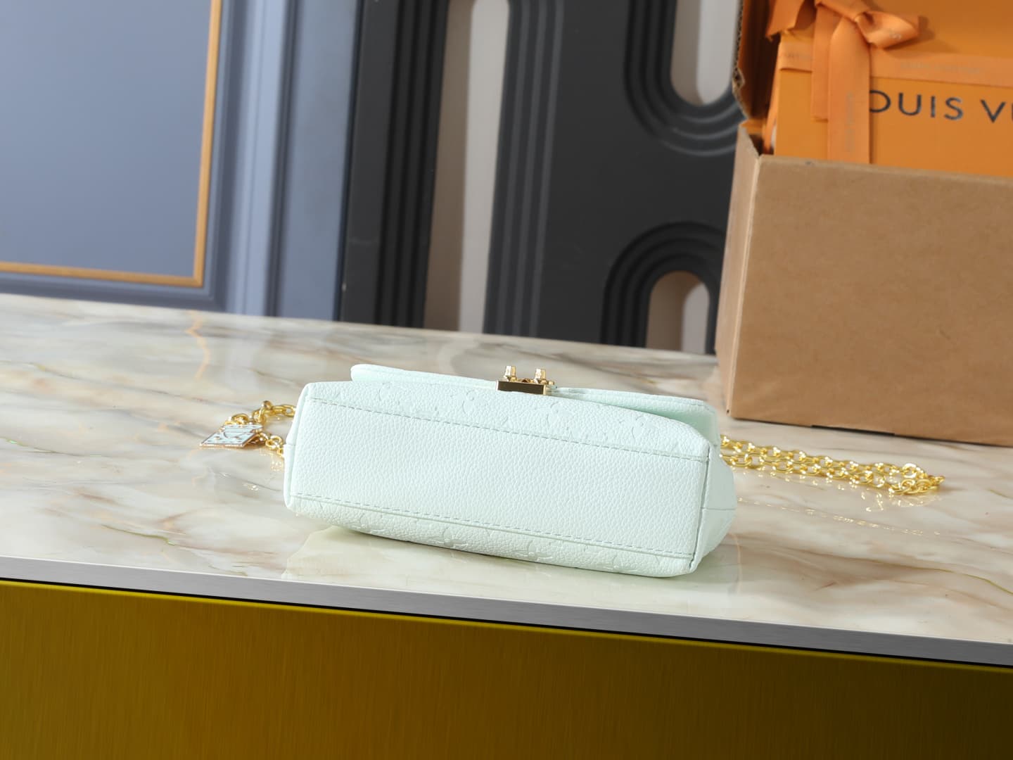 C5012 💰 Upgrade from the original M29785, M27034, M25596, M13796, M12145, M12144, and M12211. The Nano Madeleine handbag features a new seasonal design with colorful accents that can easily enhance various styles. The classic Monogram Empreinte leather bo — image 4