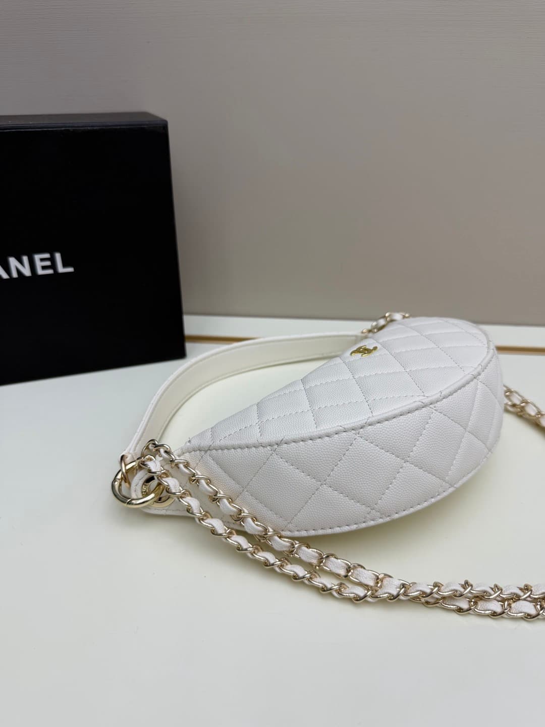 C684 Chanel 26 is a new underarm bag, shaped like a crescent. It’s very lightweight and can be carried across the shoulder. Leather made from grainy cowhide is considered one of the most durable materials used by Chanel; it doesn’t tear easily. However, t — image 2