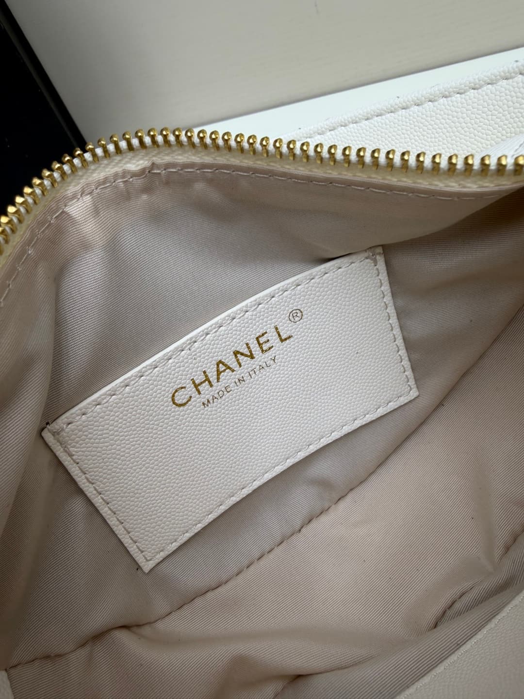 C684 Chanel 26 is a new underarm bag, shaped like a crescent. It’s very lightweight and can be carried across the shoulder. Leather made from grainy cowhide is considered one of the most durable materials used by Chanel; it doesn’t tear easily. However, t — image 8