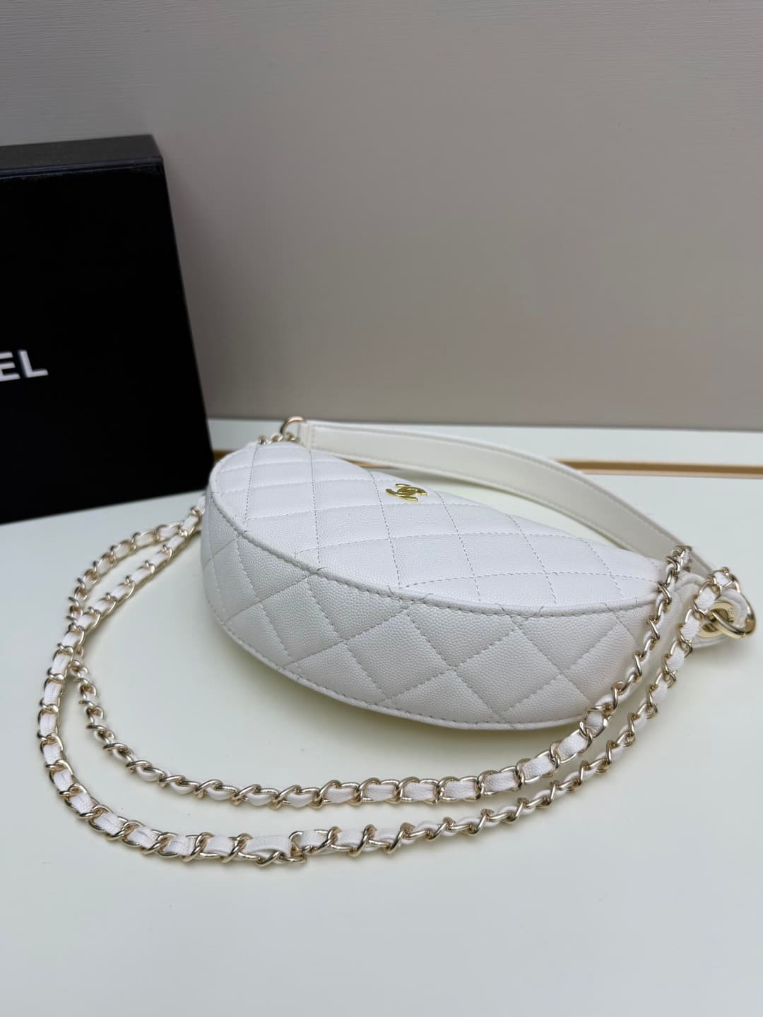 C684 Chanel 26 is a new underarm bag, shaped like a crescent. It’s very lightweight and can be carried across the shoulder. Leather made from grainy cowhide is considered one of the most durable materials used by Chanel; it doesn’t tear easily. However, t — image 6