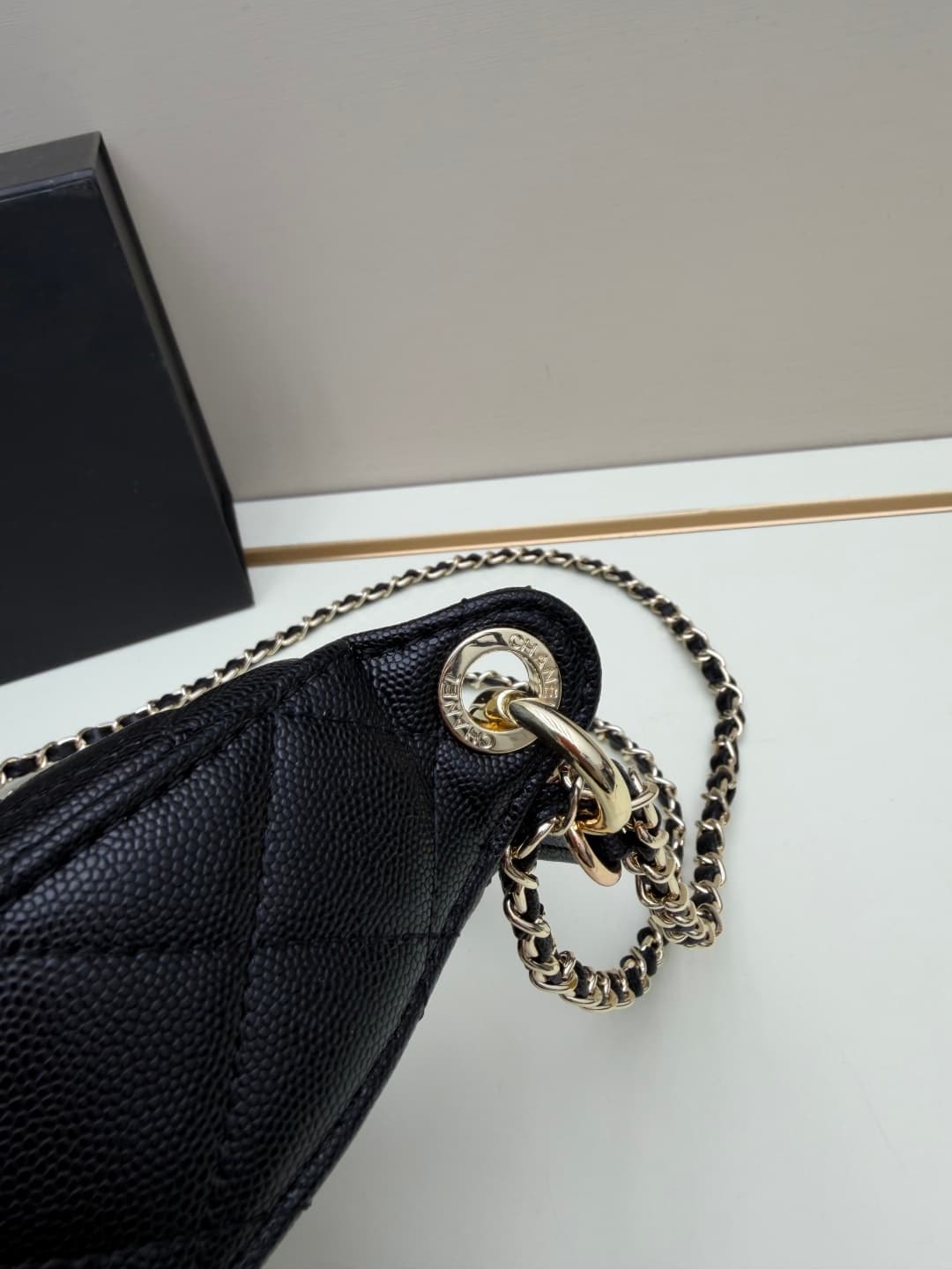 C682 Chanel 26 is a new underarm bag, with a crescent-shaped design. It’s very lightweight and can be carried across the shoulder. Leather made from grainy cowhide is considered one of the most durable materials used by Chanel; it doesn’t wear out easily. — image 6