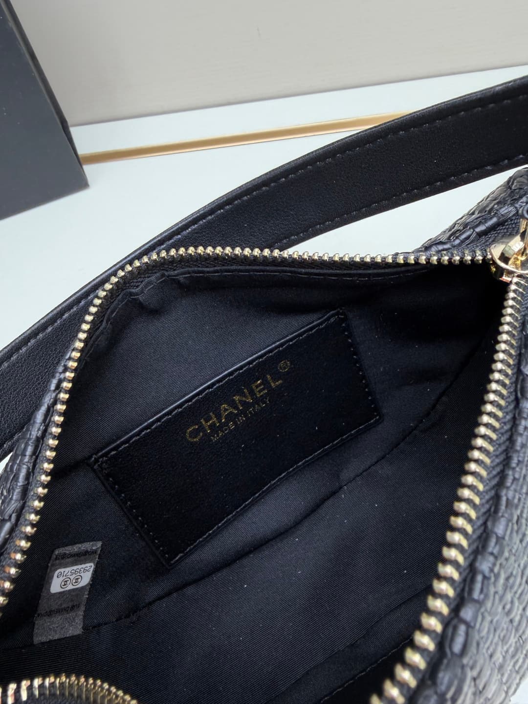 C679 Chanel 26 is a new underarm bag, shaped like a crescent. It’s very lightweight and can be carried across the shoulder. Leather made from grainy cowhide is considered one of the most durable materials used by Chanel; it doesn’t wear out easily. Howeve — image 8