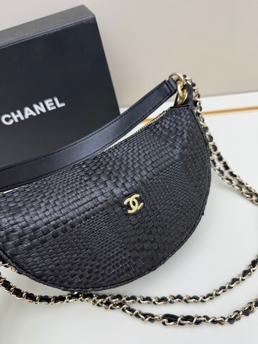 C679 Chanel 26 is a new underarm bag, shaped like a crescent. It’s very lightweight and can be carried across the shoulder. Leather made from grainy cowhide is considered one of the most durable materials used by Chanel; it doesn’t wear out easily. Howeve — image 4
