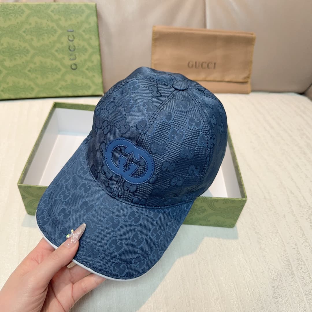 C29824 Gucci 2025 Early Autumn Collection presents a variety of energetic accessories. This baseball cap is crafted with GG nylon, adorned with interlocking G embroidery patches, bringing a unique and distinctive touch. — image 4