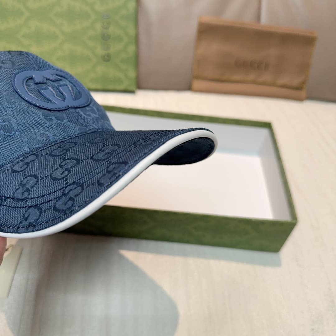 C29824 Gucci 2025 Early Autumn Collection presents a variety of energetic accessories. This baseball cap is crafted with GG nylon, adorned with interlocking G embroidery patches, bringing a unique and distinctive touch. — image 6