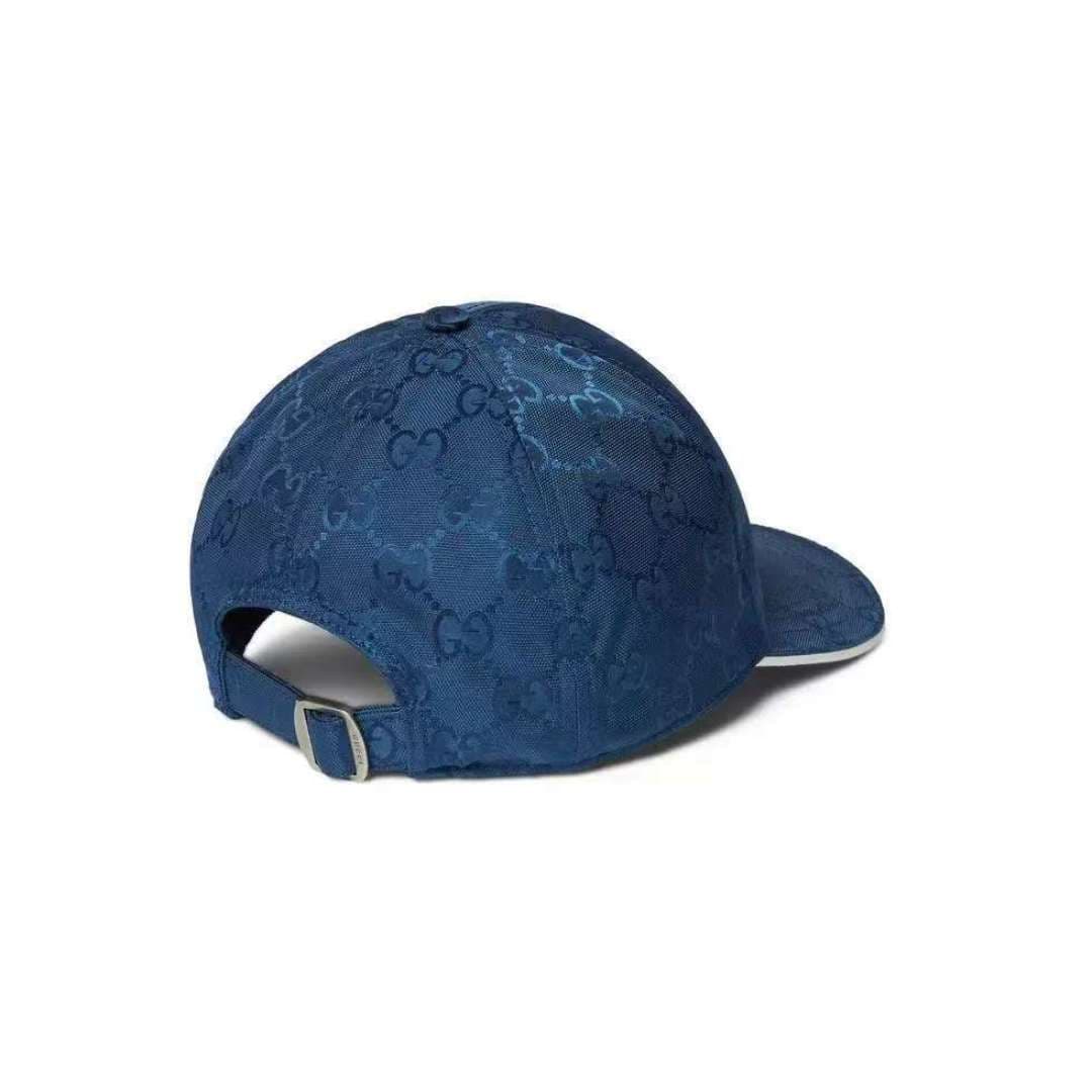 C29824 Gucci 2025 Early Autumn Collection presents a variety of energetic accessories. This baseball cap is crafted with GG nylon, adorned with interlocking G embroidery patches, bringing a unique and distinctive touch. — image 2