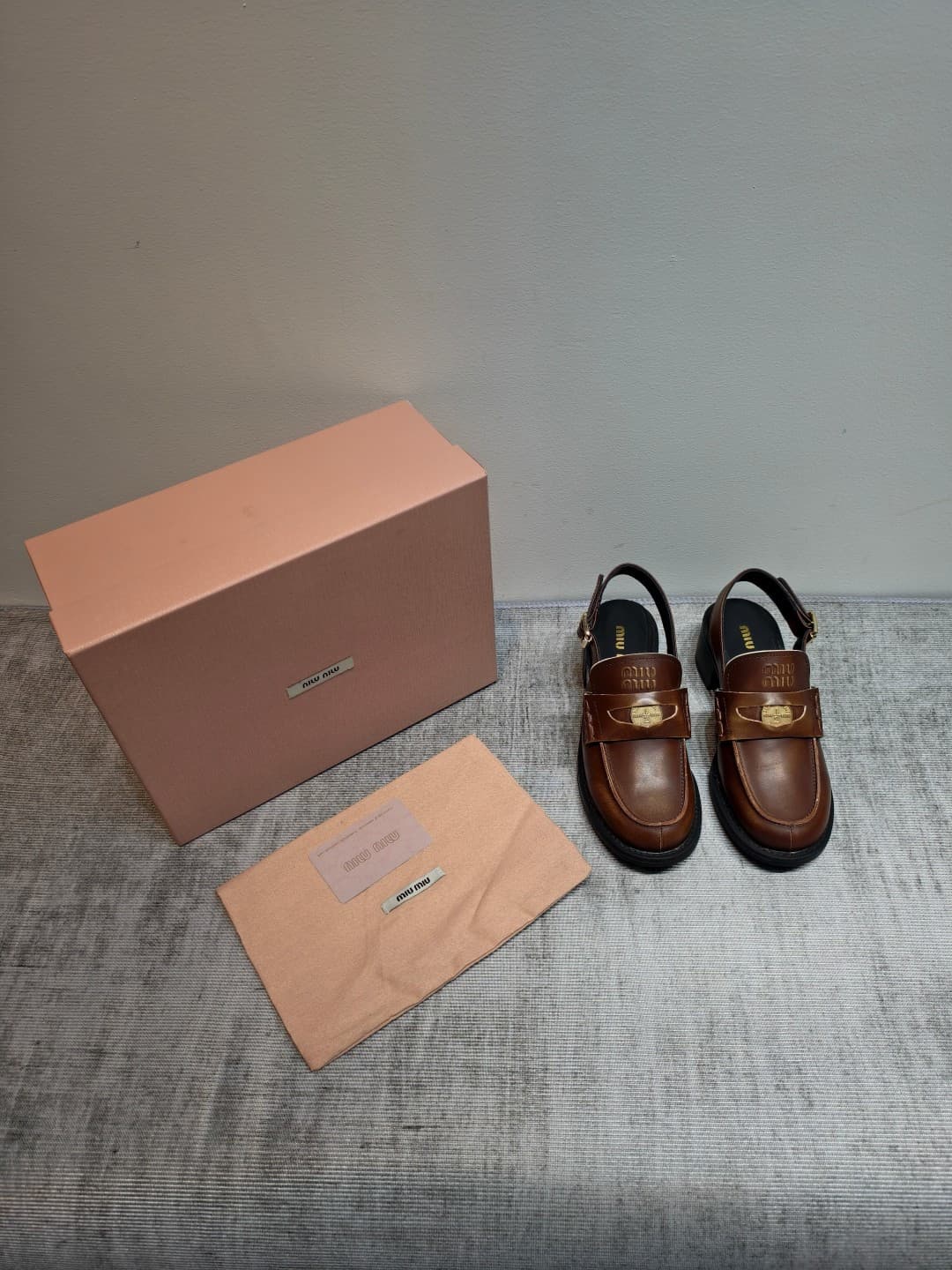 D10646 MIUMIU 2026 New Vintage/Retro Loafers – Upper: Main material is high-quality calfskin/leather; some models feature aged waxed leather for a vintage look. There are also different versions including glossy polished leather, wine-red colored leather, — image 3
