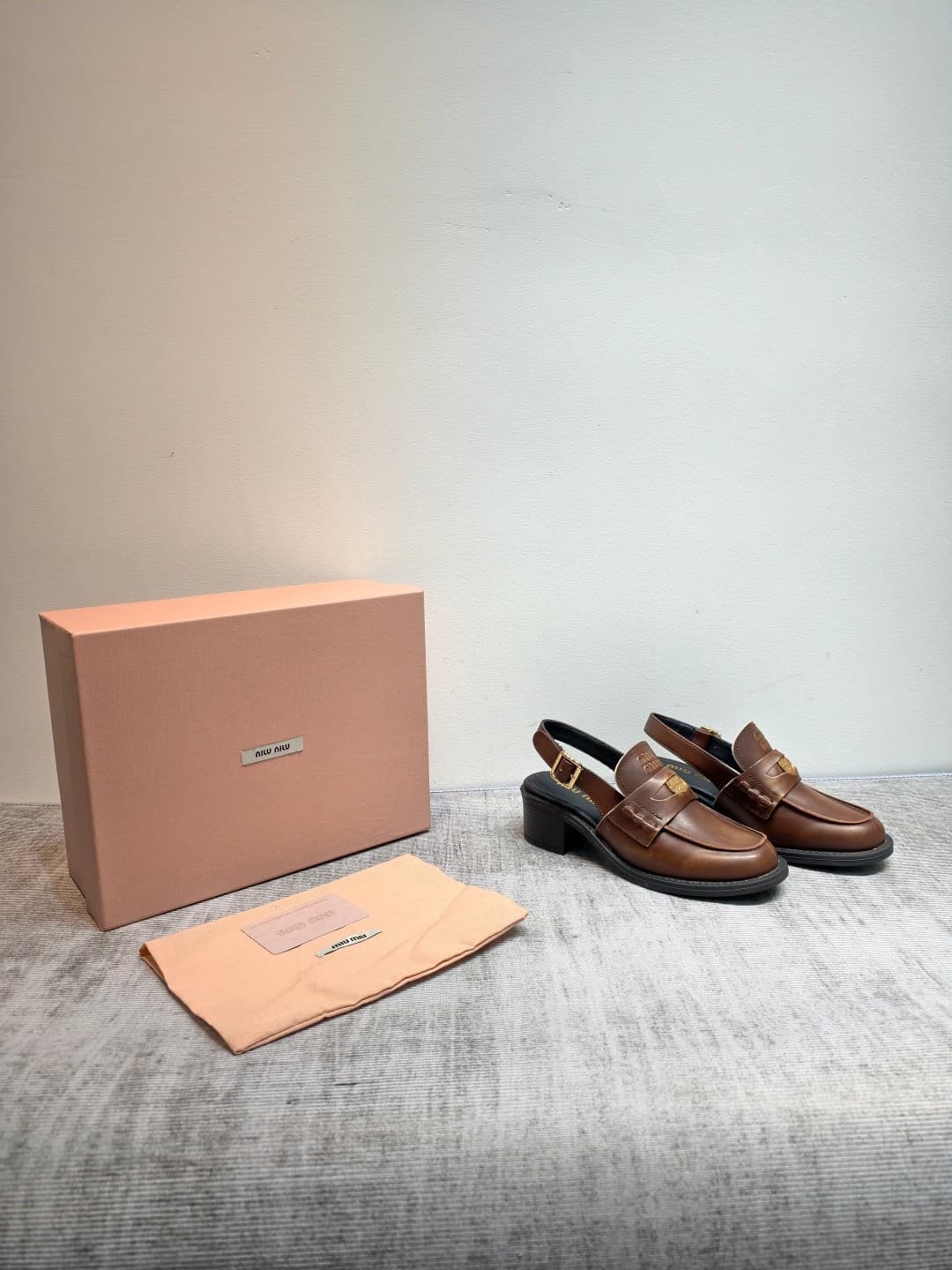D10646 MIUMIU 2026 New Vintage/Retro Loafers – Upper: Main material is high-quality calfskin/leather; some models feature aged waxed leather for a vintage look. There are also different versions including glossy polished leather, wine-red colored leather, — image 2