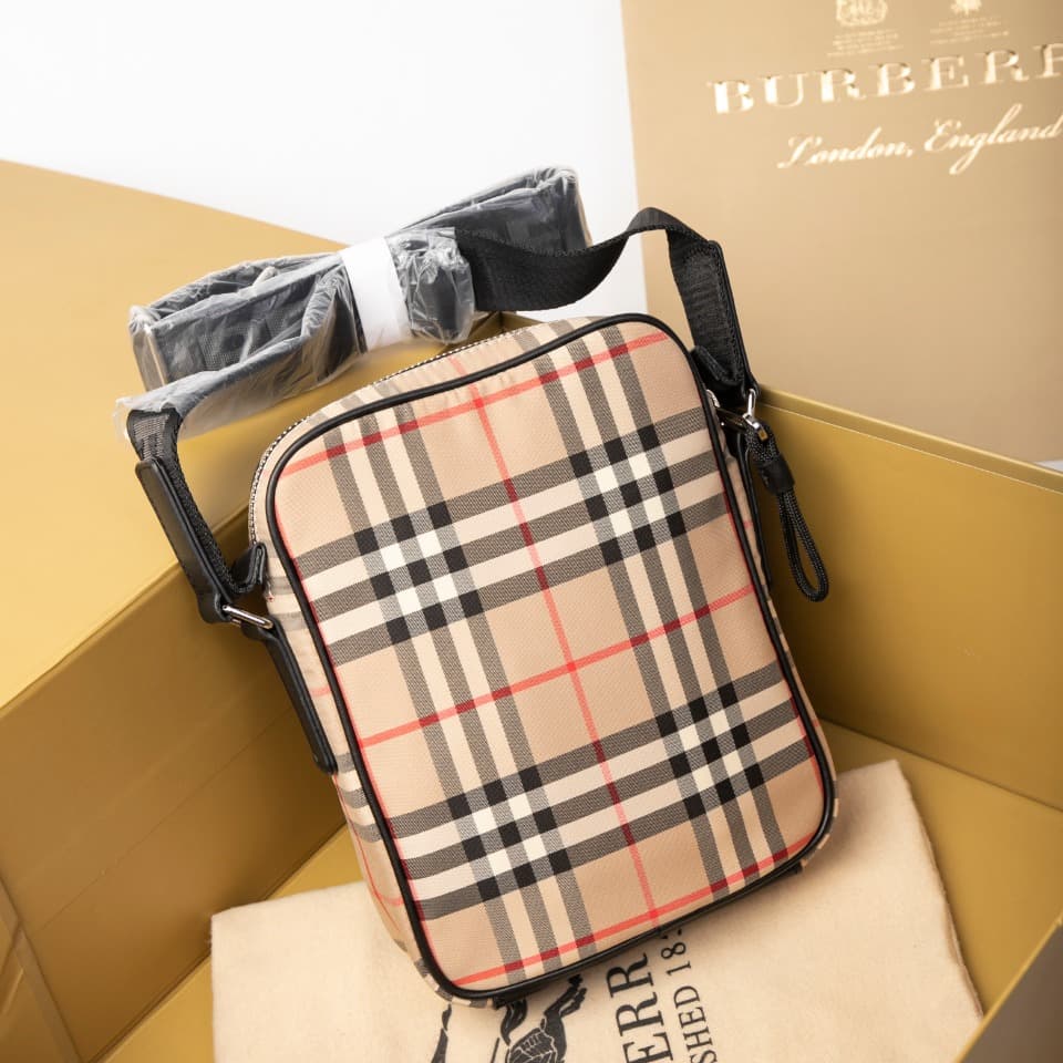 C80 280.00 B-family 1831 – a latest model, elegantly designed crossbody bag. It features checkered patterns on cotton panels, along with smooth leather trim. The design includes adjustable net nylon straps, adjustable crossbody straps, one zipper pocket;  — image 3