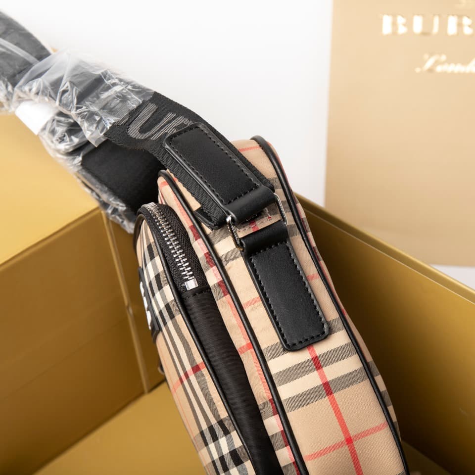 C80 280.00 B-family 1831 – a latest model, elegantly designed crossbody bag. It features checkered patterns on cotton panels, along with smooth leather trim. The design includes adjustable net nylon straps, adjustable crossbody straps, one zipper pocket;  — image 4