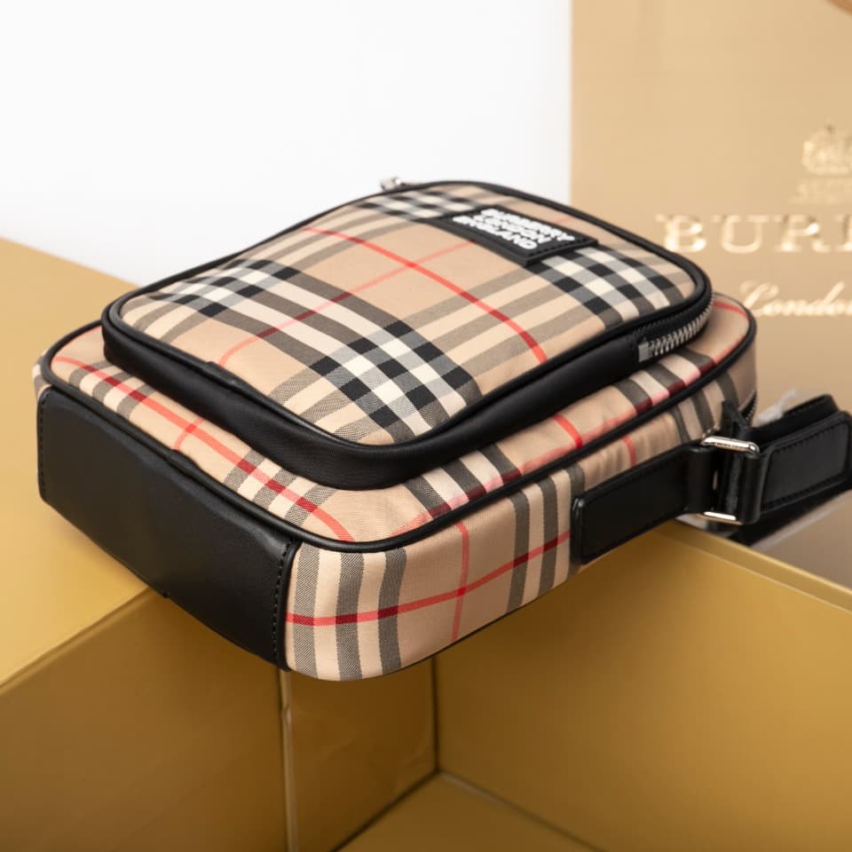 C80 280.00 B-family 1831 – a latest model, elegantly designed crossbody bag. It features checkered patterns on cotton panels, along with smooth leather trim. The design includes adjustable net nylon straps, adjustable crossbody straps, one zipper pocket;  — image 6