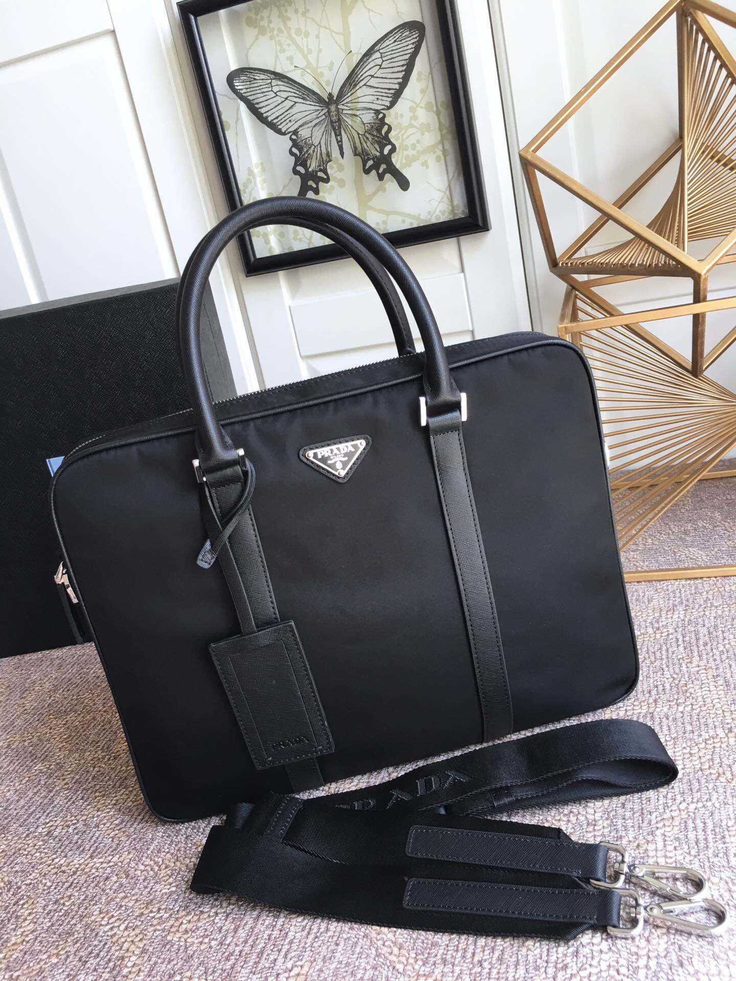 C6978 【PRADA】New model launched💗💗💗 High-quality original items 201. The latest nylon briefcase by Prada, 2VE871, uses factory-made parachute material. Features a new black real titanium zipper and cross-stitched leather trim imported from Italy. Soft text — image 1