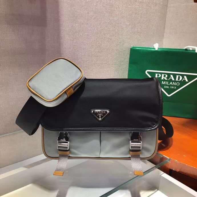 C7015 🎉Postman Bag🎉2VD769B Medium Size🎉Original style items👍👍 This nylon flap handbag features a classic Saffiano leather trim, with two side-clasp closures and a distinctive triangular metal logo, highlighting a fashionable design. It’s made of imported — image 1