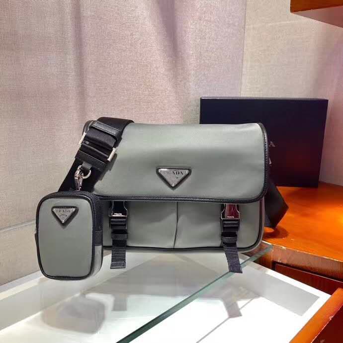 C7014 🎉New Color 🎉2VD769B🎉Original product 👍👍 This nylon flap handbag features classic Saffiano leather trim, two side-opening closures, and a distinctive triangular metal logo, showcasing a fashionable design. It’s made of imported nylon and Saffiano lea — image 1