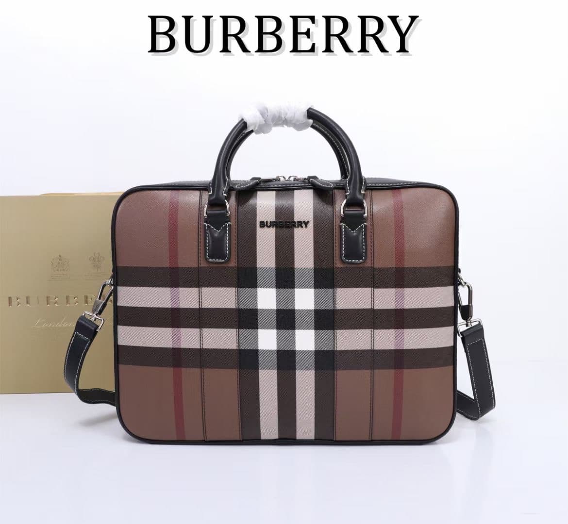 C8230 -B Brand’s latest briefcase is crafted from checked and Italian tanned leather, with a branded logo design. It can be carried in a handbag style, or worn on the shoulder using detachable straps. At least 30% of the materials used in this product are — image 1