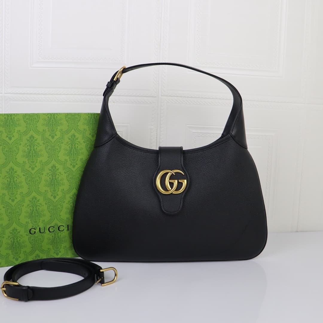C4038 🌟 The “Aphrodite Collection” medium crescent-shaped shoulder bag from the GucciCosmogonie series was presented at the historic Monte Carlo in Italy. On the runway, aesthetic elements from different eras and locations blend together, connecting the p — image 1