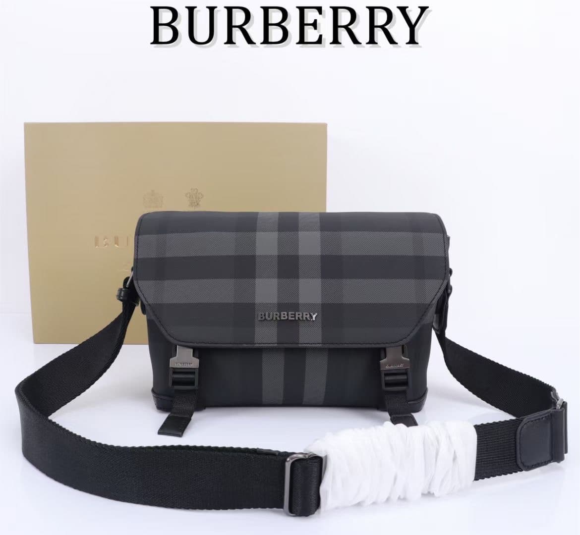 C141 The Balmain messenger bag features a structured design, with a brand’s charcoal-gray pattern. It is adorned with smooth leather details and a logo design. There are zipper pockets for storing small items. The adjustable shoulder strap contributes to — image 1