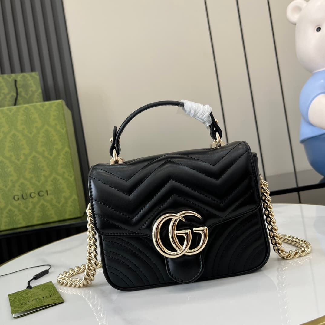 C4020 GG Marmont collection mini handbag. The GG Marmont collection presents a new silhouette with classic colors, exuding the charm of early autumn. This handbag is made of Gucci Black (Rosso Ancora) V-shaped leather sewn together, with detachable buckle — image 1