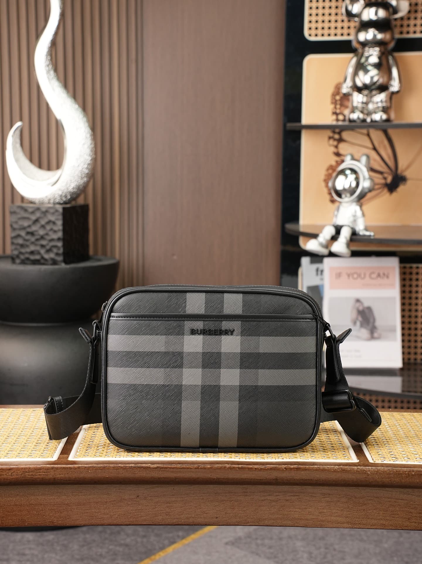C84 B’s latest exquisite crossbody backpack features Burberry plaid patterns and smooth leather trim. It is adorned with the brand’s logo design, and comes with adjustable mesh straps. — image 1