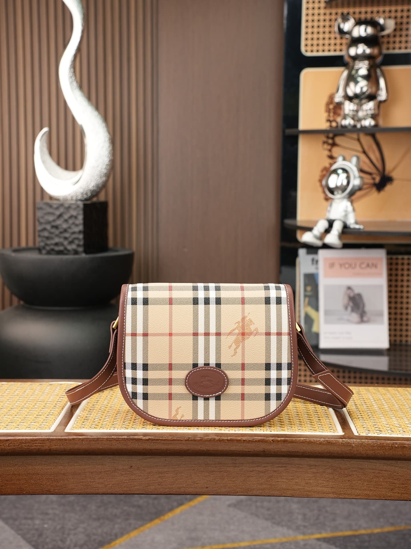 C87 Vintage/retro Bur “crossbody bag with Maja check vintage material – looks more relaxed and casual. Graffiti logos are bold and straightforward, giving a distinct feel right away. It embodies BUR’s iconic style; truly elegant and charming. The design i — image 1