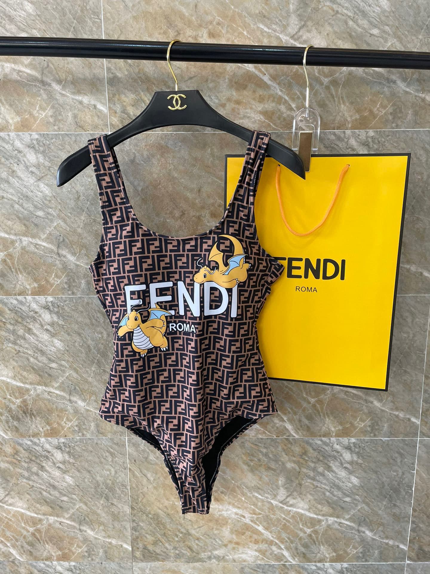 C24892 Fendi swimsuit – Fendi’s new backless one-piece swimsuit in black. Simple and elegant design; suitable for various swimming scenarios 🏊♀️. It can be used at the beach, swimming pool, hot spring, water park, or for rafting activities 😌. It can also — image 1
