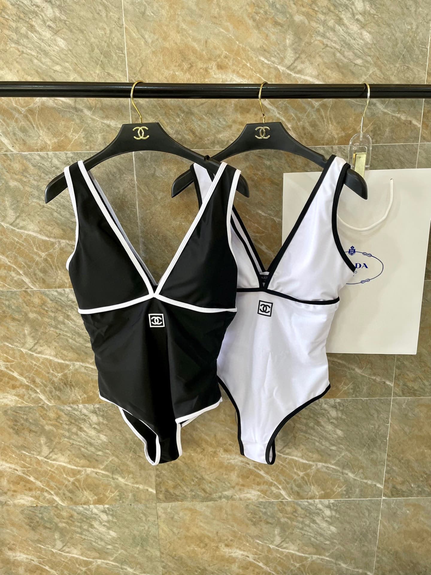 C24899 Chanel swimsuit – Chanel’s new backless one-piece swimsuit in black, simple and elegant. It’s suitable for various swimming scenarios 🏊♀️ Whether at the beach, in a swimming pool, in hot springs, or at water parks – it works well 😌 It can also be — image 1