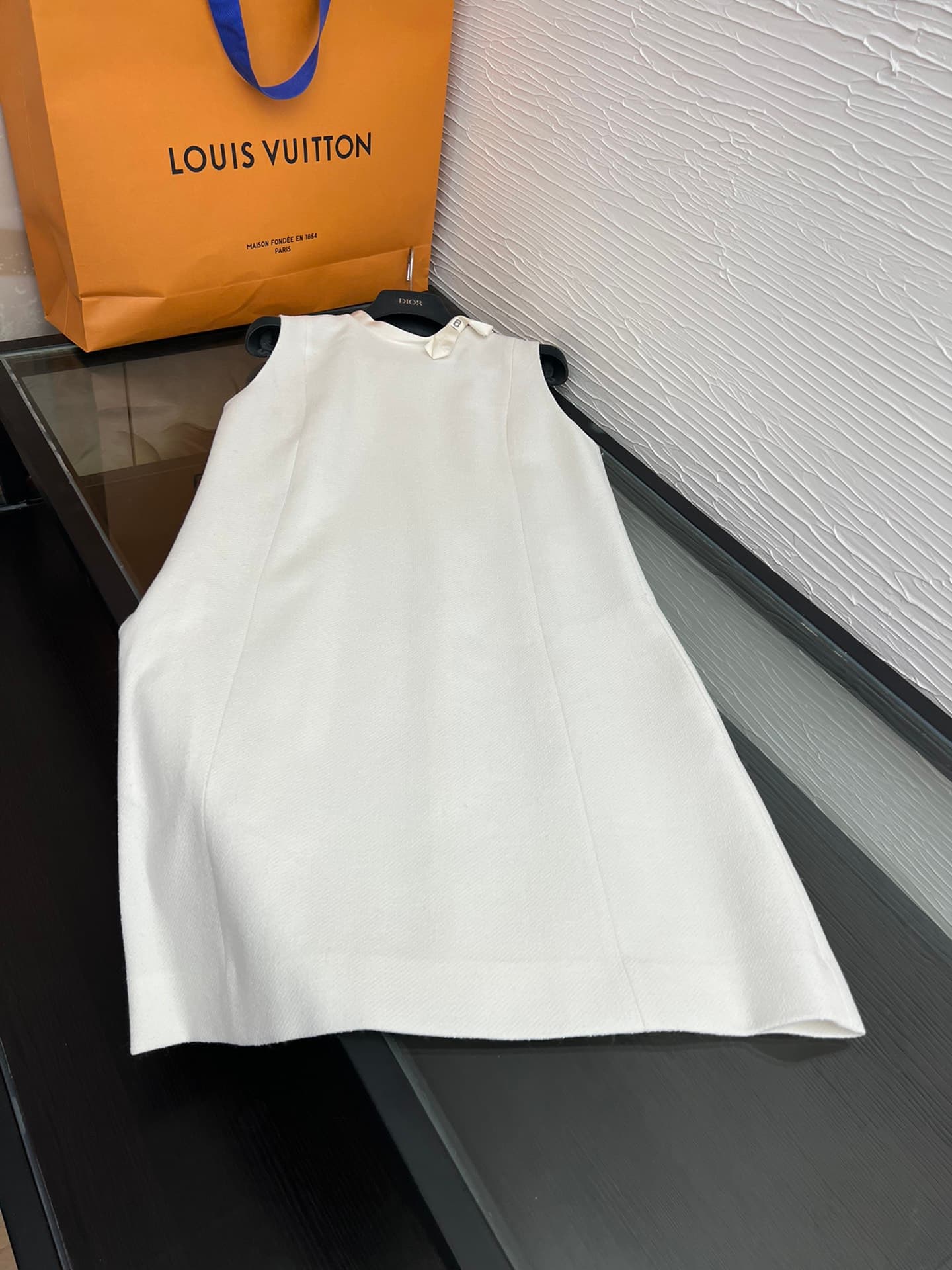 C18391 Image of the white dress laid flat — image 1