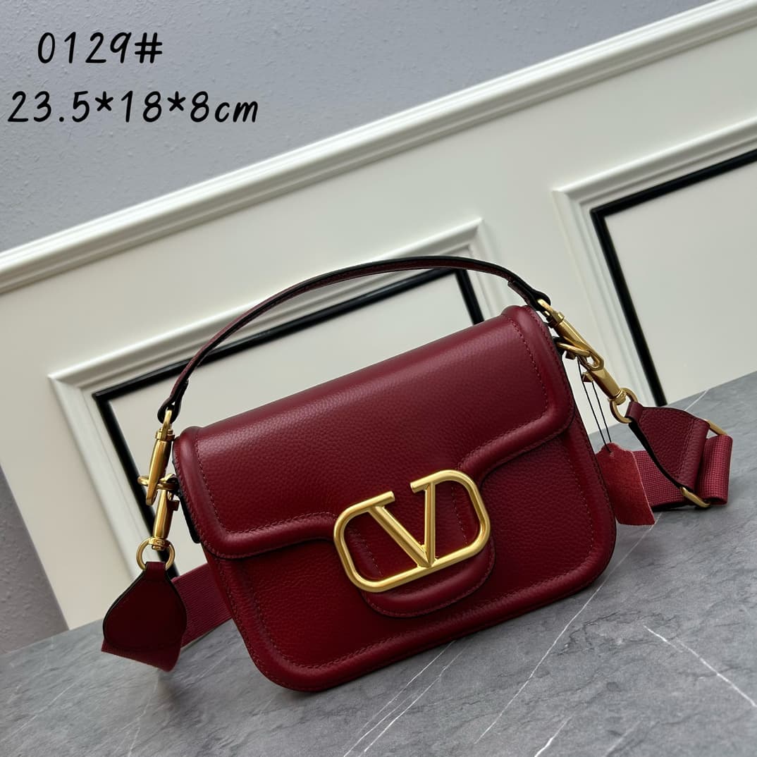 C8208 VALENTINO GARAVANI ALLTIME vintage/retro soft grain calf handbag, featuring metal VLOGO SIGNATURE details. With detachable handles and a leather strap, this bag can be carried on the shoulder, slung over the arm, or held in hands. - Vintage brass ag