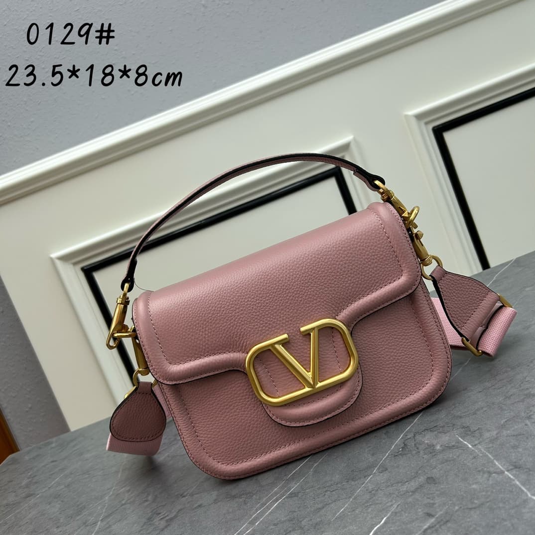 C8207 VALENTINO GARAVANI ALLTIME vintage/retro soft grain calf handbag, featuring metal VLOGO SIGNATURE details. With detachable handles and a leather strap, this bag can be carried on the shoulder, slung over the arm, or held in hand. - Vintage brass age