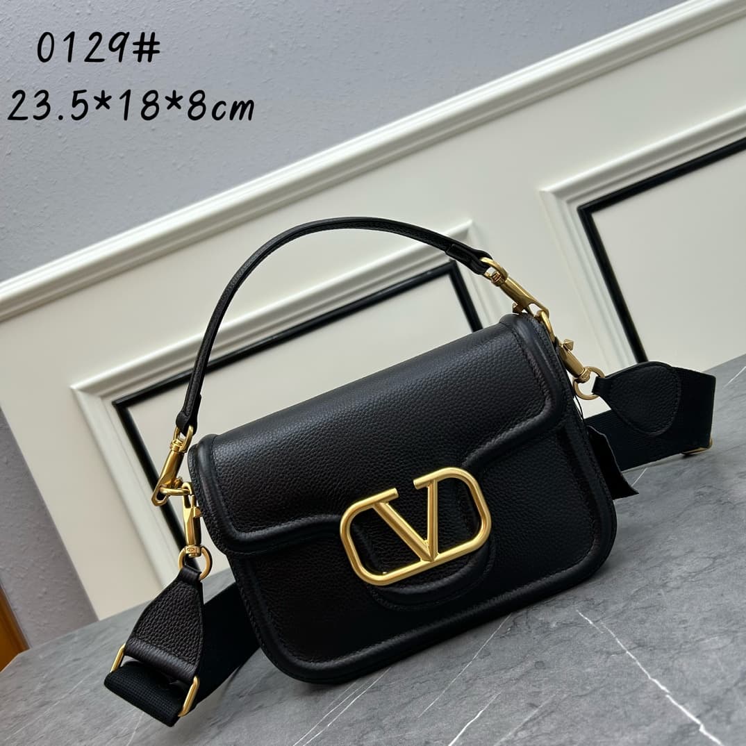 C8210 VALENTINO GARAVANI ALLTIME vintage/retro soft grain calf handbag, featuring metal VLOGO SIGNATURE details. With detachable handles and a leather strap, this bag can be carried on the shoulder, slung over the arm, or held in hands. - Vintage brass ag
