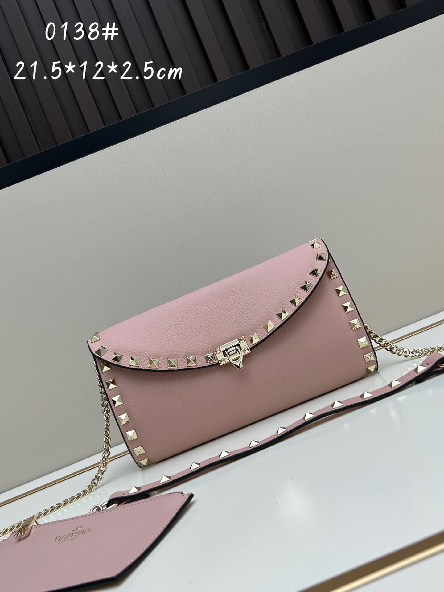C8299 Garavani Rockstud Mini leather crossbody bag, featuring the iconic hook closure design — image 1