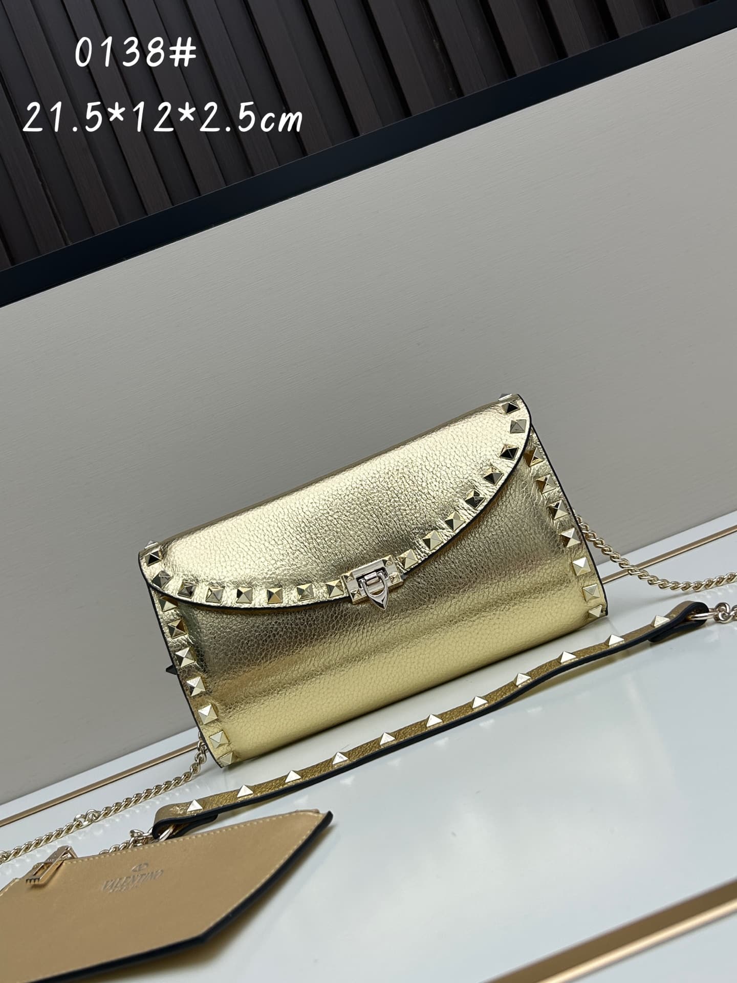 C8298 Garavani Rockstud Mini leather crossbody bag, featuring the iconic hook closure design — image 1